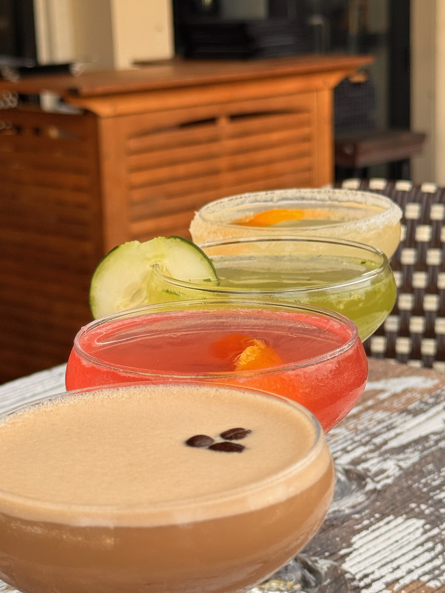 A flight of handcrafted cocktails